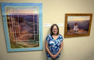 Carolyn Bloom with paintings
